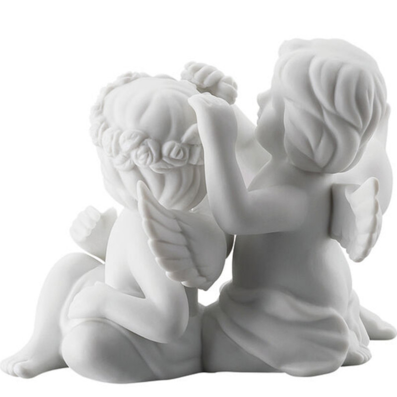 Para aniołów małych z kwiatami